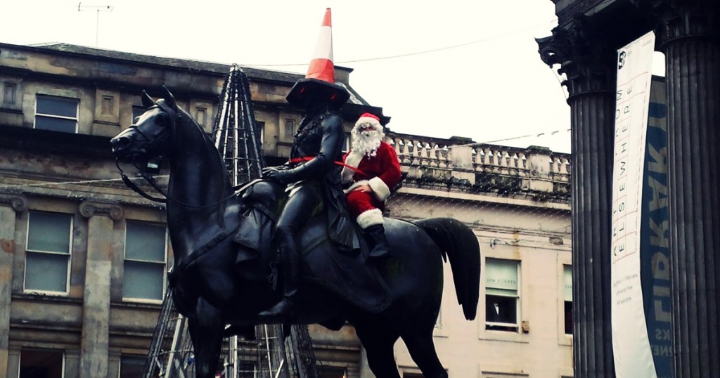 Santa protesting on the Duke of Wellington's Horse , Glasgow